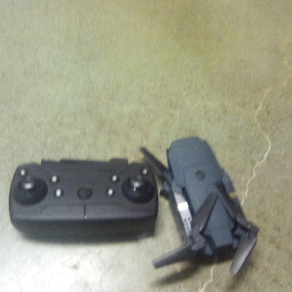 Black and Gray Drone with Controller